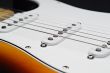 Electric guitar pickups and strings