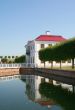 white  house with red roof