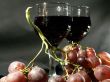 Bunch of grapes and red wine