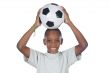 boy holding a soccer ball
