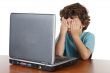 Kid covering his eyes