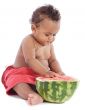 Baby eating watermelon