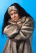 young woman in fur coat