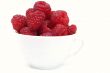 Raspberry on glass  cup
