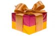 Presents with gold ribbon isolated on white background