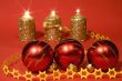 Gold candles and red glass balls