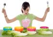 girl with colourful bowls