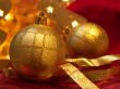Christmas ornaments on red