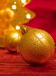 Christmas ornaments on red