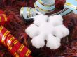 Christmas snowflake and ribbons on fluffy background