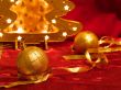 Christmas ornaments on red