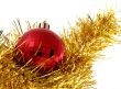 Christmas red ornaments and gold tinsel
