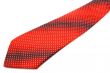  Red tie.