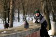 The teenager observes of pigeons