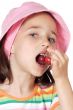 Girl eating cherries