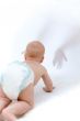 Baby crawling to unfamiliar hands