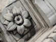 Carved stone flower