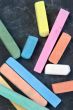 blackboard with coloured crayons