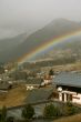 Rainbow across alpine village