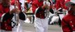 Red trombone players