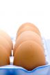 yellow eggs in box