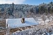 Roof, snow anf forest in winter