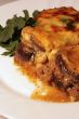 Lamb moussaka with egg plant, cheese and herbs