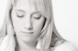 Studio portrait of a long blond girl relaxing