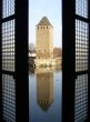 tower and reflection through the window