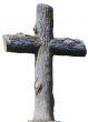 Isolated stony christian cross of wooden logs