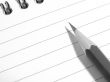 notepad with pencil