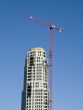 Red Crane on Construction Tower