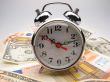 alarm clock and money