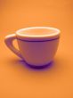 cup on orange background