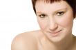 Studio portrait of a flirting young woman with short hair