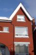 Snowed red-bricked townhouse in downtown Toronto