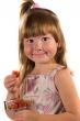 Little girl with strawberries