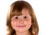 Studio portrait of a pretty smiling girl