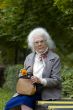 Old woman sitting on the bench