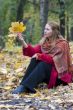 Beautiful woman in the autumn park
