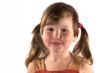 Smiling little girl with ponytails