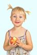 Girl holding apple