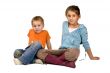 Brother and sister looking at you
