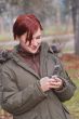 Teen checking her mobile phone