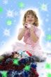 Beautiful little girl with christmas decoration