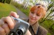 woman with  camera in park