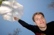 guy with  white umbrella above  head