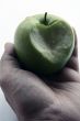 Green Apple in men hand