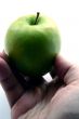Green Apple in men hand