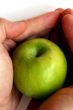 Green Apple in men hand